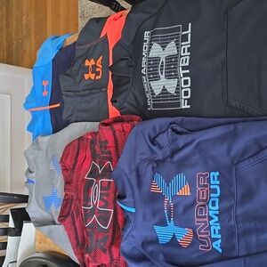 Lot of boys under armour hoodies.